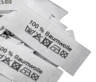 100% Baumwolle mit Pflegesymbole