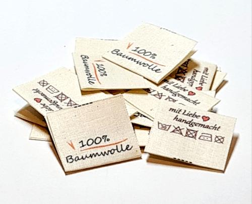 Textile Drucketiketten auf Naturbaumwolle, Öko-Tex zertifiziertes Band in naturfarben, mittig gefalten