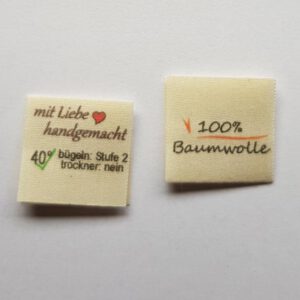 100% Baumwolle, Textiletiketten mittig gefalzt, Lizenzfrei