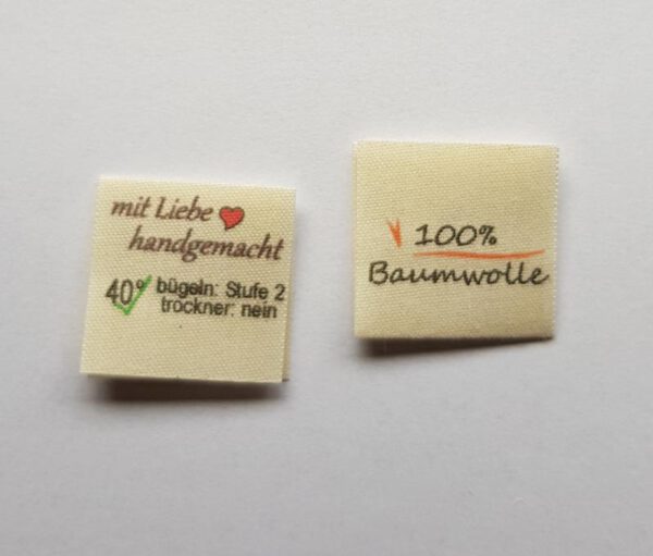 100% Baumwolle, Textiletiketten mittig gefalzt, Lizenzfrei