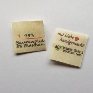 100% Bauwolle, Textiletiketten mittig gefalzt, Lizenzfrei