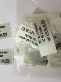 Textiletiketten Silbergrau 50 Stück bedruckt: 70% Polyester, 30% Wolle