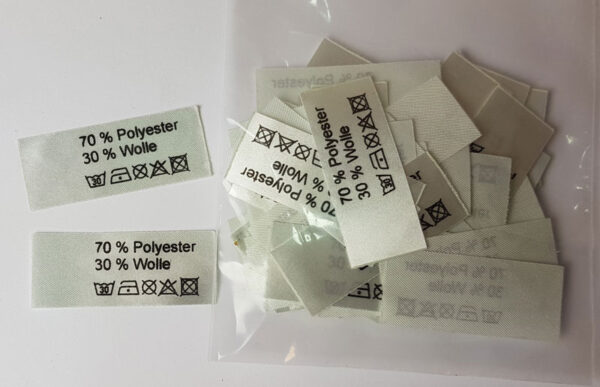 AW-084 Textiletiketten Silbergrau 50 Stück bedruckt: 70% Polyester, 30% Wolle