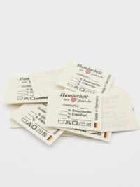 10 St. Textiletiketten Universal Mittelfalte