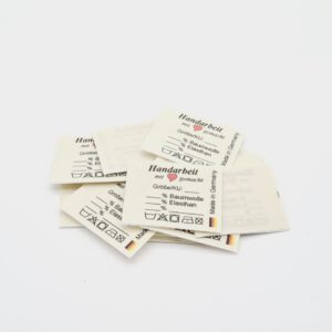 10 St. Textiletiketten Universal Mittelfalte