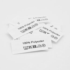 50 Textiletiketten mit der Aufschrift 100% Polyester und Pflegesymbole