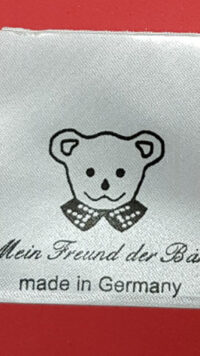 Textiletiketten mit einfarbig aufgedrucktem Motiv; Universell und Ausfüllbar.