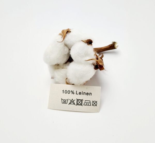 Textiletiketten aus Naturbaumwollband mit der Aufschrift 100% Leinen