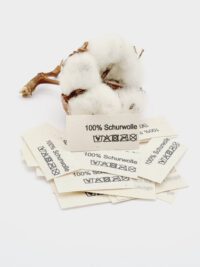 50 Textiletiketten aus Naturbaumwollband mit der Aufschrift 100% Schurwolle