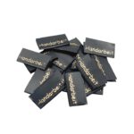 20 Textiletiketten Handarbeit -  schwarz/gold